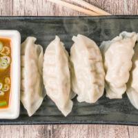 Chinese Dumplings (6) · Vegetarian. Steamed, choice of vegetable or chicken, served with house sauce.
