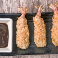 Shrimp Tempura (3) · Lightly battered shrimp tempura served with tangy fruity sauce.