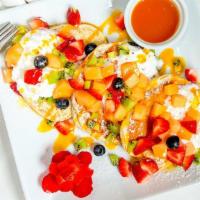 Maui Pancake · Vegetarian. Fresh tropical fruits with passion fruit and mango syrup.
