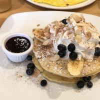Blueberry Lavender Pancake · Vegetarian. Lavender infused blueberry syrup with fresh blueberries, banana, almonds and whi...