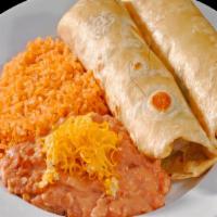 Two Carne Asada Burritos · two steak burritos with pico de gallo and guacamole inside and rice and beans on the side