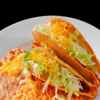 Two Tacos · two hard shell tacos with rice and beans (can be made soft if you ask  ground beef shredded ...