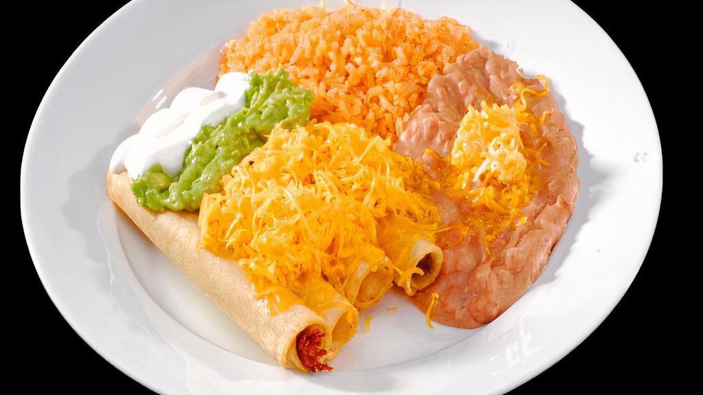 Four Rolled Tacos · four rolled tacos(flautas) with cheese,sour cream and guacamole on top and rice and beans on the side