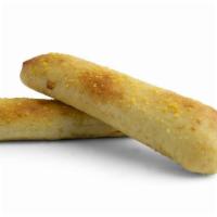 Cheese Stuffed Breadsticks · Crispy garlic butter parmesan breadsticks filled with mozzarella cheese and baked to perfect...