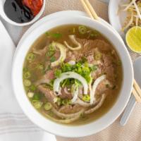 Beef Pho · Savory beef broth noodle soup served with rice noodles, rare steak, beef
brisket, beef meatb...