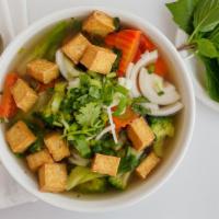 Vegan Pho · Savory vegetable broth noodle soup served with rice noodles, tofu, carrots,
broccoli and ass...