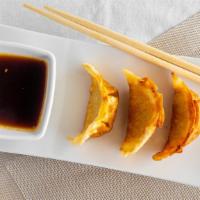Potstickers( 6 Pcs) · Dumplings filled with pork and mushrooms, served
with sriracha sesame soy sauce.
