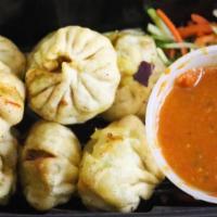 Deep Fried · Deep Fried MoMos served with a Nepali Achar(dipping sauce)