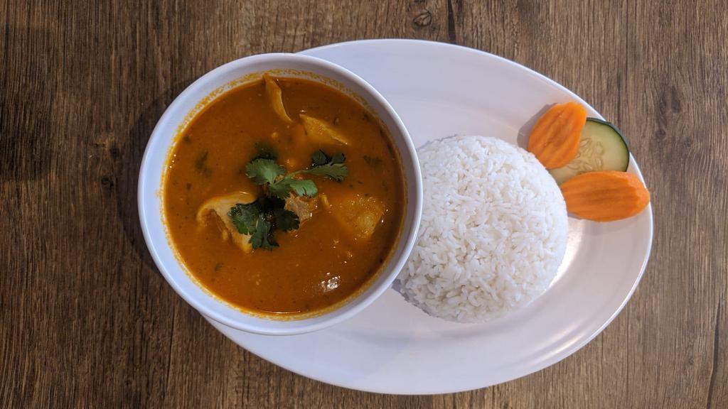Nepali Chicken Curry  · An aromatic and mild chicken curry cooked with tomatoes and blend of Himalayan spices. Served with rice.