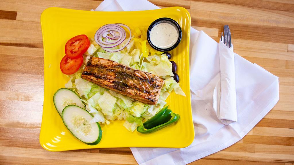 Grilled Salmon · Cooked on a rack over a grill.
