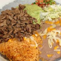 Carne Asada Plate · Includes rice and beans.