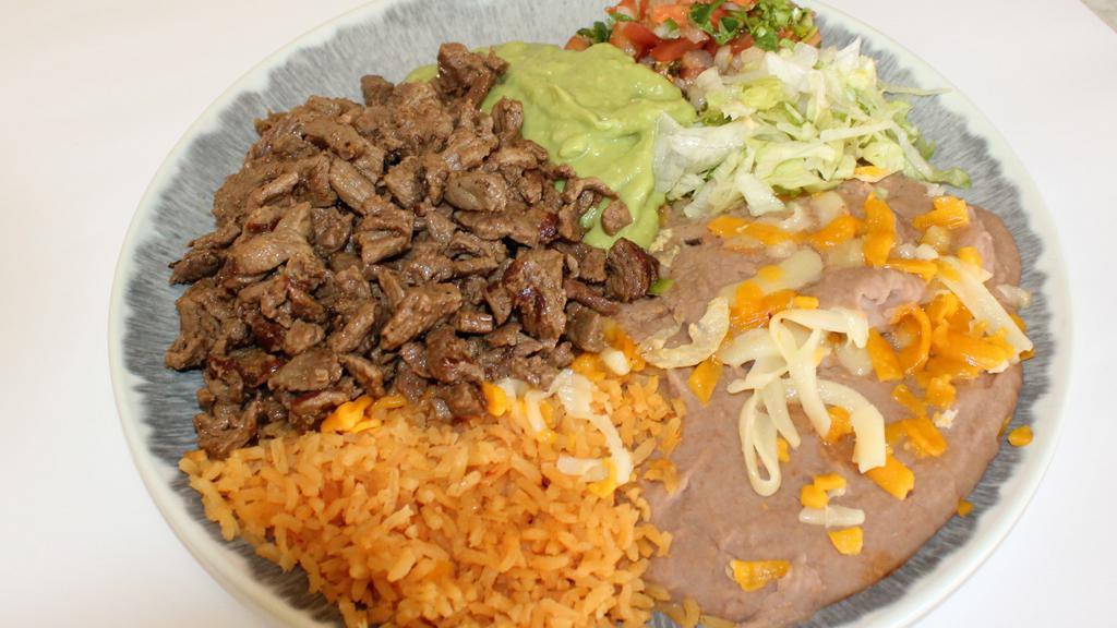 Carne Asada Plate · Includes rice and beans.