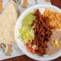 Adobada Plate · Includes rice and beans.