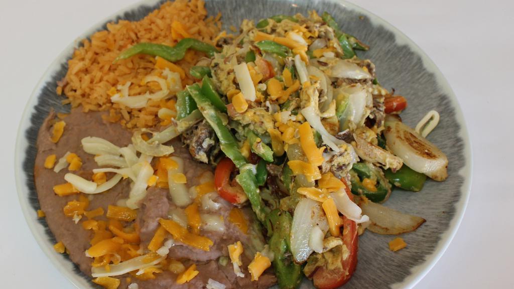  Machaca Plate · Includes rice and beans.