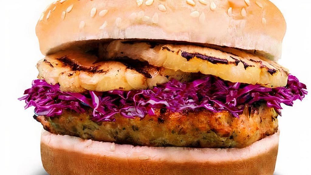 Hawaiian Salmon Burger · 1/4 lb patty, red cabbage, slaw pineapple, ginger vinaigrette, and barbecue glaze.