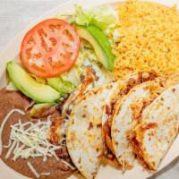 Cheese Quesadillas · Cheese quesadilla in corn or flour tortilla. Dinner includes three quesadillas, rice, and be...