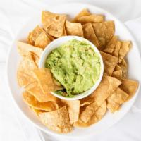 Guacamole And Chips · Avocado dip served with chips.