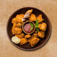 Chicken Forge Fritter · Crispy fried chicken fritter made with gram flour, ginger garlic & spice and herbs