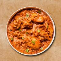 Chicken Talkie Masala · Cubes of tender chicken prepared in the tomato sauce and cream with indian spices served wit...