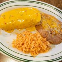Chimichanga · Chicken, Mexican rice, black beans, cheddar jack cheese, deep-fried, topped with chili con q...