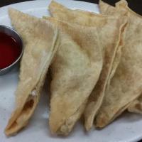 Crab Rangoon · 5 cream cheese, crab meat, and green onions stuffed in a wonton wrapper.