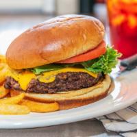 Classic Burger · Served on a brioche bun. Lettuce, tomato, onion, pickle.