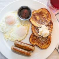 Cinnamon Swirl Bread Combo · cinnamon swirl bread french toast,two eggs and choice of (2)bacon OR (2)sausage links