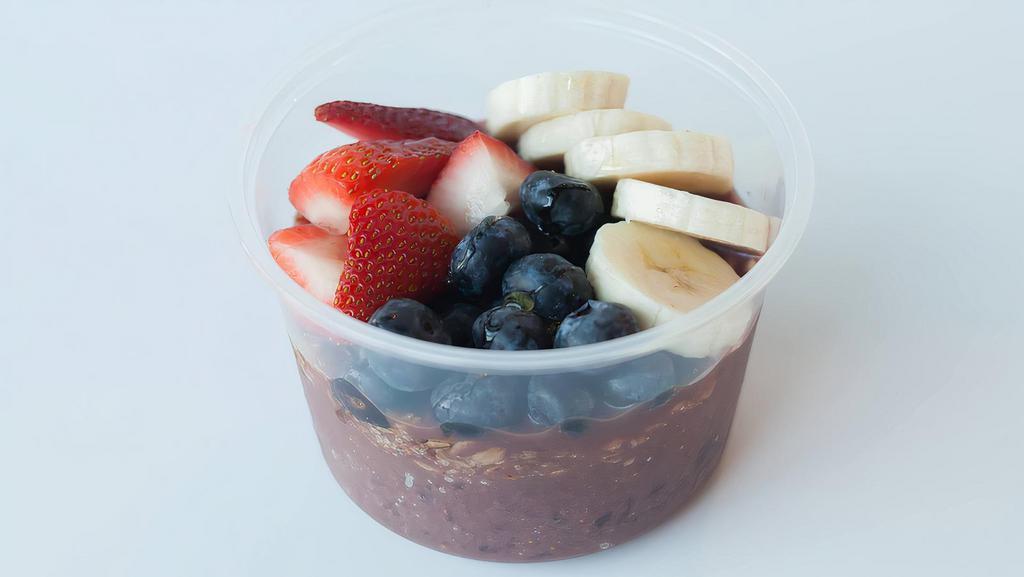 Vitality Bowl · Granola, strawberries, blueberries, bananas, honey