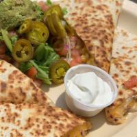Half Stack Quesadilla · Choice of chicken or steak, mixed peppers, grilled onions and mixed cheese. Served with lett...