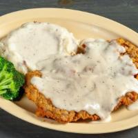 Country Fried Steak · Favorite. Tender steak, lightly breaded and golden fried. Smothered with country milk gravy ...