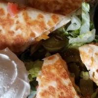 Quesadillas · Cheddar jack, tomatoes, scallions, sour cream, salsa, and jalapenos