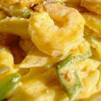 Chipotle Pasta · Penne pasta and vegetables with your choice of shrimp or chicken tossed in a creamy, house-m...