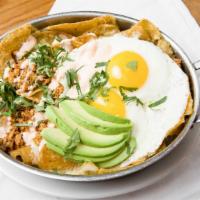 Chilaquiles · Corn tortilla chips, roasted tomatillo salsa, Chihuahua cheese, avocado, cholula sour cream ...