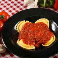 Ravioli (Dinner) · A generous portion of cheese stuffed raviolis topped with your choice of our signature sauce...