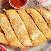Stuffed Cheese Bread · Stuffed with mozzarella and sprinkled with Parmesan cheese.
