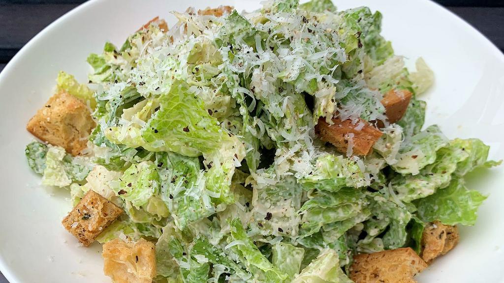 Side Caesar Salad · Romaine, Herb Focaccia Croutons, Garlic Caesar Dressing, Parmesan Cheese