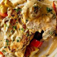 Chicken Marsala · Grilled Chicken topped with a creamy mushroom Marsala sauce, served with Herb Roasted Potato...