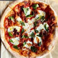 Margherita · Fresh Mozzarella, Oven-Dried Tomato, Fresh Basil, Olive Oil