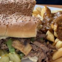 Philly Steak Sub · Grilled steak with grilled onions, peppers, and mushrooms, melted Swiss cheese on a grilled ...