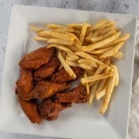 Caza'S Wings · Eight traditional wings with your choice of barbeque or medium sauce served with french fries.
