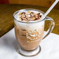 Iced Caramel Macchiato · An iced combination of freshly pulled espresso, vanilla syrup, caramel syrup, milk, and ice....