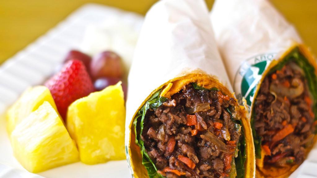 Bulgogi Breakfast Wrap · A breakfast wrap made fresh with Korean marinated grade a beef sautéed with yellow onions and carrots. Wrapped with two eggs and cheddar cheese. Comes with a side of fruits. (Banana, strawberry, grapes, and orange. ).
