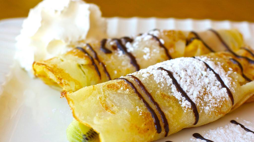 Fresh Fruit Crepes · Homemade fresh crepes. Contains: greek yogurt, fresh fruits (pineapple, strawberry, and kiwi), whipped cream, and chocolate drizzle. Customization available with nutella and fruits.