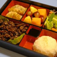 Bento Box · Cha's original unique bento (lunch) box. Contains: choice of meat, house or caesar salad wit...