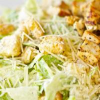 Chicken Caesar Salad · Freshly made caesar salad. Base of romaine with caesar dressing, chicken, croutons, crackers...