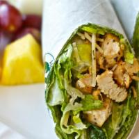 Chicken Caesar Wrap · Freshly made caesar salad wrap with grilled chicken and Pepper-Jack cheese. Wrapped in a spi...