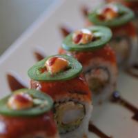 All About Fire Roll · All about Cha's original sushi roll.
A california roll with tempura shrimp inside.
Topped wi...