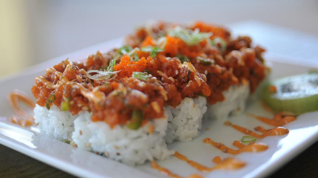 All About Tuna Roll · All about Cha's original sushi roll.
A california roll base.
Topped with spicy tuna, jalapeño slices, and sesame seed.
Sauce: spicy mayo
Comes with a cup of miso soup.