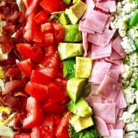 Cobb Salad · (mixed greens, grilled chicken, bacon, eggs, blue cheese, avocado, red onion, tomato, cucumb...