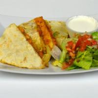 Steak & Shrimp Quesadilla · A grilled flour tortilla stuffed with your choice of filling cheese mixed peppers and onions...